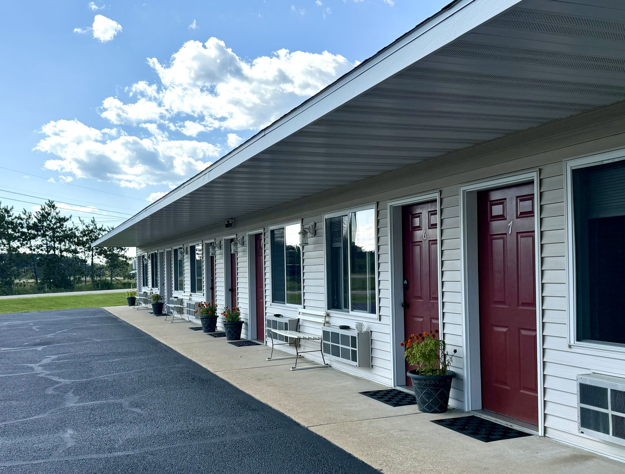 Covered walkway along the motel's guest room entrances